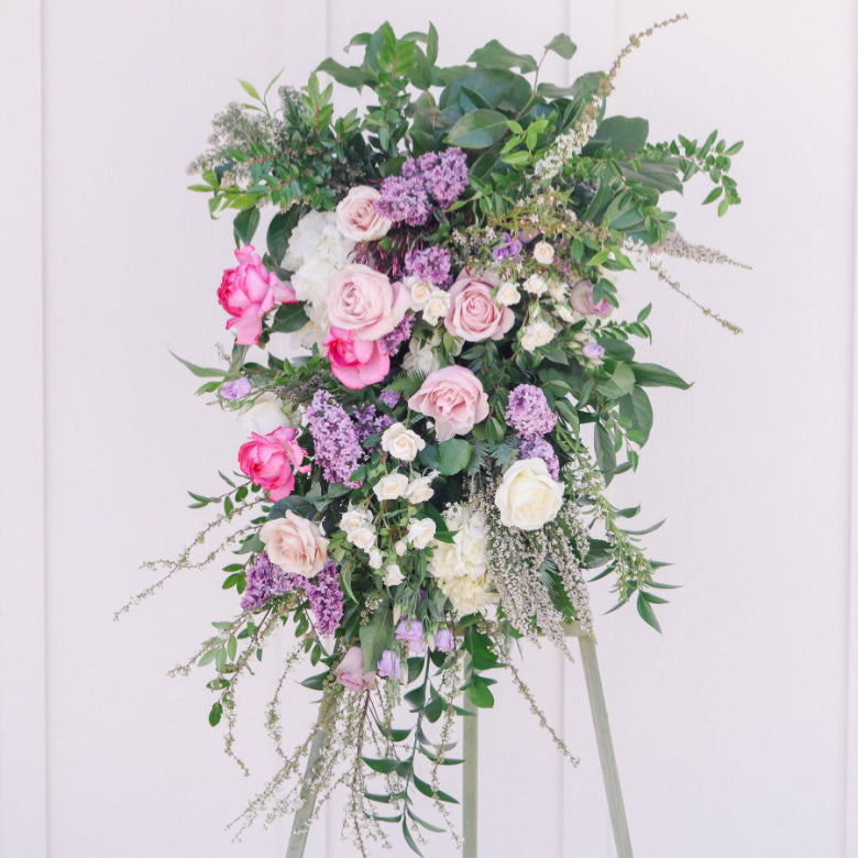 gorgeous rose easel standing spray for memorial or funeral