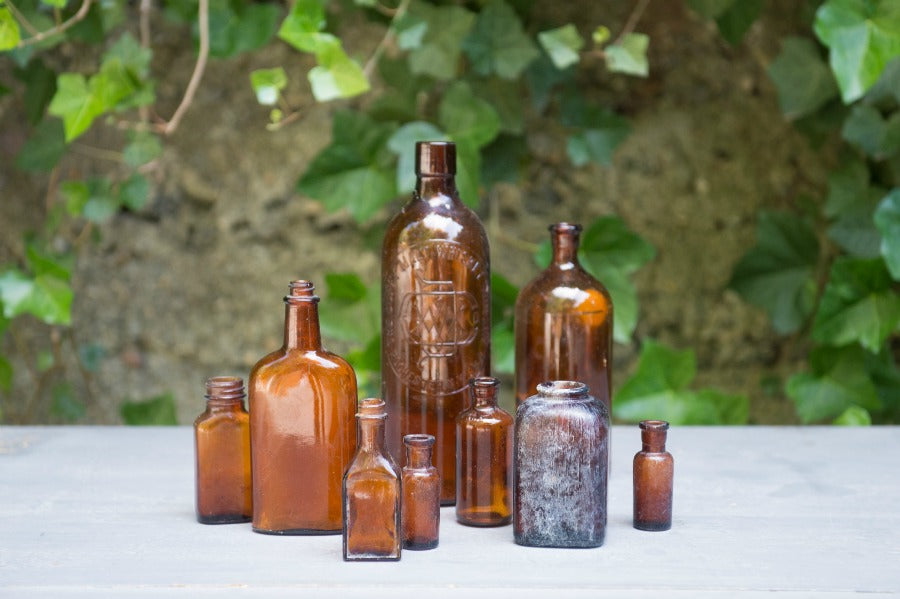 vintage brown whiskey bottles