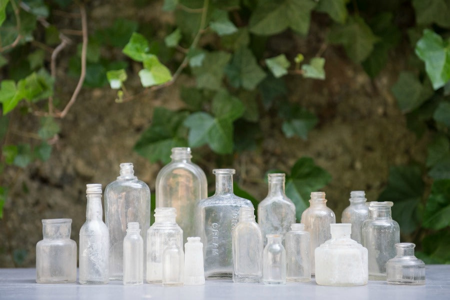 white distressed vintage bottles
