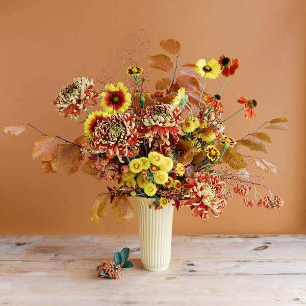 yellow + red fall bouquet by seascape flowers aptos ca florist