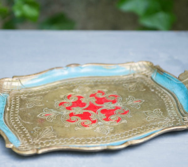 blue, gold, and red vintage tray