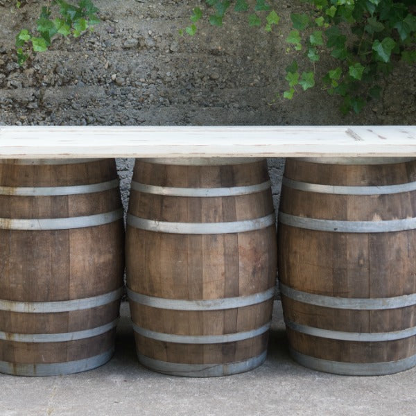 wine barrel bar with a reclaimed door top